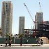 Some residents of Turnberry Place (towers at left) are selling their condominiums because of construction of a parking garage, at right, for the Fontainebleau Las Vegas.