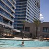 Residents enjoy the pool recently at Panorama Towers, where condo sales have not stalled. The twin high-rises have closed escrow on 99 percent and 95 percent of their units since 2006 and 2007, respectively. 