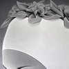 Painter James Rieck, who teaches at Corcoran College of Art and Design in Washington, D.C., chose to focus on the sleek bathing caps in a German fashion catalog advertising "Kurort" wear at mineral baths. 