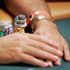 A player stacks lucky charms on his chips during the pot-limit hold 'em event of last year's World Series of Poker at the Rio.