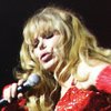 Charo does a little audience interaction in a performance Wednesday at the Riviera. In the show, the Spanish-born performer embraces her caricature.
