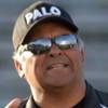 Palo Verde coach Dave Castro talks to some of his players during practice Friday afternoon at Mackay Stadium in Reno, Nev. Palo Verde will face McQueen High School in the 4A high school championship game Saturday. 