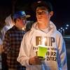 Cameron Mich'l, left, consoles Tara Zarvian during a vigil for her brother Trevor Zarvian,19, at Windmill Parkway and Thayer Avenue in Henderson Sunday, Feb.19, 2012. Trevor Zarvian died in an auto accident at the site Saturday. Also killed was Johnny Castiblanco, 19, and an 86-year-old man.
