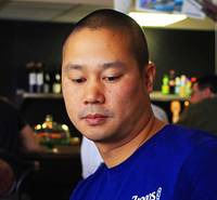 The Blue Man Group unveils Zappos CEO Tony Hsieh from within a rolling case during the 10th Annual Zappos Bald and Blue charity event on Wednesday, May 15, 2014. The Blue Man Group unveils Zappos CEO Tony Hsieh from within a rolling case during the 10th Annual Zappos Bald and Blue charity event on Wednesday, May 15, 2014.