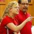 Unruly teachers union members cause a scene but can't deter layoff vote