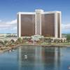 This artist's rendering released Wednesday, March 27, 2013, by Wynn Resorts shows a proposed resort casino on the banks of the Mystic River in Everett, Mass. This artist's rendering released Wednesday, March 27, 2013, by Wynn Resorts shows a proposed resort casino on the banks of the Mystic River in Everett, Mass.