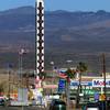 Family repairing ‘World’s Largest Thermometer’ in Baker Family repairing ‘World’s Largest Thermometer’ in Baker