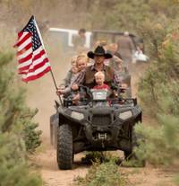 Ryan Bundy, son of Nevada rancher Cliven Bundy, rides an ATV into Recapture Canyon north of Blanding, Utah, on Saturday, May 10, 2014, in a protest against what demonstrators call the federal government's overreaching control of public lands. The area has been closed to motorized use since 2007 when an illegal trail was found that cuts through Ancestral Puebloan ruins. The canyon is open to hikers and horseback riders. Ryan Bundy, son of Nevada rancher Cliven Bundy, rides an ATV into Recapture Canyon north of Blanding, Utah, on Saturday, May 10, 2014, in a protest against what demonstrators call the federal government's overreaching control of public lands. The area has been closed to motorized use since 2007 when an illegal trail was found that cuts through Ancestral Puebloan ruins. The canyon is open to hikers and horseback riders.