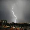 A bolt of lightning strikes in the north east valley as a thunderstorm makes its way through Las Vegas Wednesday morning, Sept. 28, 2022. 
