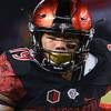 San Diego State running back Donnel Pumphrey Jr. gets past University of Houston safety Garrett Davis during the Las Vegas Bowl Saturday, Dec. 16, 2016, at Sam Boyd Stadium. San Diego State won the game 34-10. Pumphrey set the NCAAs all-time rushing record for Division 1-A schools during the game. San Diego State running back Donnel Pumphrey Jr. gets past University of Houston safety Garrett Davis during the Las Vegas Bowl Saturday, Dec. 16, 2016, at Sam Boyd Stadium. San Diego State won the game 34-10. Pumphrey set the NCAAs all-time rushing record for Division 1-A schools during the game.