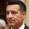 Nevada Republican Gov. Brian Sandoval responds to reporter's questions about health care and the opioid epidemic after a session called "Curbing The Opioid Epidemic" at the first day of the National Governor's Association meeting Thursday, July 13, 2017, in Providence, R.I.