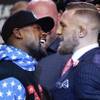 Mayweather and McGregor will fight in smaller gloves Mayweather and McGregor will fight in smaller gloves