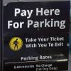 People pay for parking at the MGM Grand parking garage Tuesday, Dec. 20, 2016.
