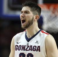 Gonzaga's bench reacts after a 3-point shot during the second half of a West Coast Conference tournament NCAA college basketball game Monday, March 5, 2018, in Las Vegas. Gonzaga defeated San Francisco 88-60.