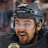 Vegas Golden Knights left wing William Carrier, center, celebrates with Vegas Golden Knights defensemen Alec Martinez (23) and Alex Pietrangelo (7) after scoring against the Calgary Flames during the third period of an NHL hockey game at T-Mobile Arena Thursday, Feb. 23, 2023.
