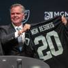 Jim Murren, right, chairman and CEO of MGM Resorts International, poses with Marc Badain, president of the Las Vegas Raiders, during a news conference at Mandalay Bay Thursday, Jan. 23, 2020. MGM Resorts International announced a founding partnership with the Las Vegas Raiders.