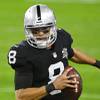 Las Vegas Raiders quarterback Marcus Mariota (8) looks for a receiver during the first half of a game against the Los Angeles Chargers at Allegiant Stadium Thursday, Dec. 17, 2020. Las Vegas Raiders quarterback Marcus Mariota (8) looks for a receiver during the first half of a game against the Los Angeles Chargers at Allegiant Stadium Thursday, Dec. 17, 2020.