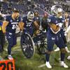 Nevada running back Toa Taua (35) is tackled by UNLV's Cameron Oliver (25) during the first half of an NCAA college football game in Reno, Friday, Oct. 29, 2021. Nevada running back Toa Taua (35) is tackled by UNLV's Cameron Oliver (25) during the first half of an NCAA college football game in Reno, Friday, Oct. 29, 2021.