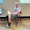 Christopher Enzenauer, 57, sits Monday, July 18, 2023, on a plastic chair to escape triple-digit heat in a cooling center within the Cambridge Recreation Center. Las Vegas has been under an excessive heat warning since last week.