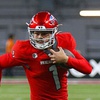 UNLV Rebels quarterback Jayden Maiava (1) warms up before an NCAA football game against the Wyoming Cowboys at Allegiant Stadium Friday, Nov. 10, 2023.