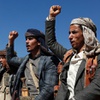 Houthi fighters and tribesmen stage a rally against the U.S. and the U.K. strikes on Houthi-run military sites near Sanaa, Yemen, on Sunday, Jan. 14, 2024.
