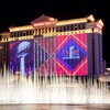 Super Bowl LVIII signage and displays are projected onto Caesars Palace, Bellagio fountain and all around the Las Vegas strip, Wednesday, February 3, 2024.