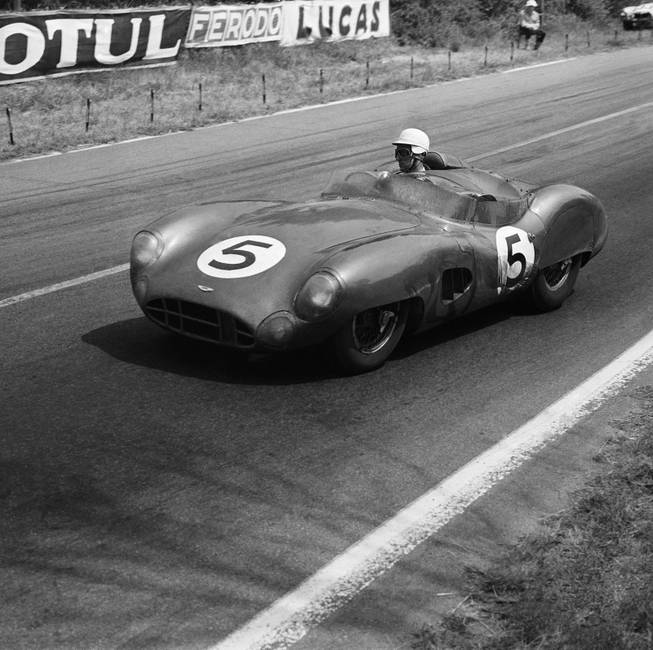 Carroll Shelby of the United States rounds the Mulsanne curve of the Le Mans circuit  in France, June 21, 1959, in his Aston Martin during the famed 24- hour International Endurance Race for sports cars. With his co-driver, American Roy Salvadori, He won the event at the average speed of 112.4 miles per hour. 
