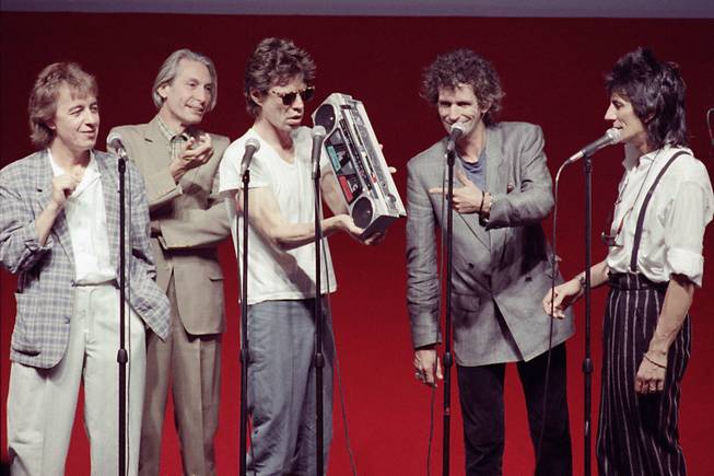 The Rolling Stones appear at a news conference to annouce their upcoming tour of the U.S., July 11, 1989.  From left to right:  Bill Wyman, Charlie Watts, Mick Jagger, Keith Richards and Ron Wood. 