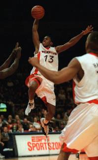 St. John's guard Felipe Lopez (13) soars to the hoop in second half action against the University of Connecticut Monday, Jan. 19, 1998, at Madison Square Garden in New York. St. John's upset U. Conn. 64-62. 
