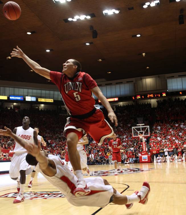 UNLV guard Derrick Jasper shoots and gets fouled during the game against New Mexico on Jan. 9 at The Pit in Albuquerque, N.M. The Rebels beat the 15th-ranked Lobos, 74-62.