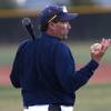 College of Southern Nevada baseball coach Tim Chambers hit ground balls to his infielders earlier this month in preparation for Friday's season opener against Arizona Western.