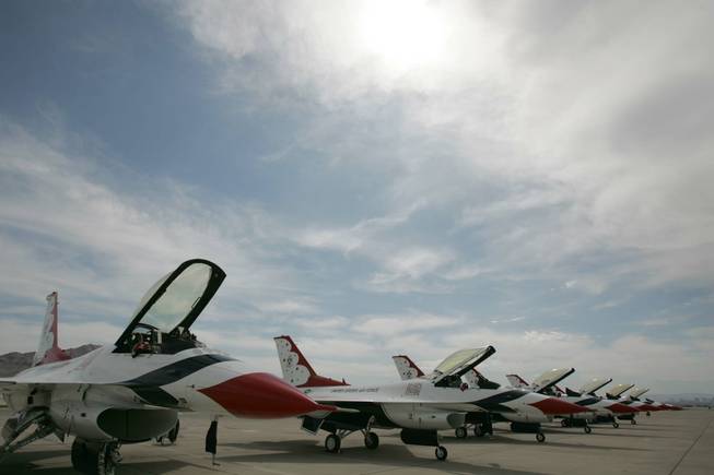 F-16 jets from the U.S. Air Force Air Demonstration Squadron Thunderbirds perform during their annual approval show Thursday at Nellis Air Force Base.