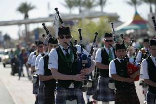 Members of the Desert Skye Pipes & Drums Las Vegas perform Saturday during the 43rd annual Sons of Erin St. Patricks Day Parade on Water Street.