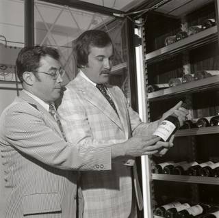 In this undated photo Jerry Vallen, left, and Larry Ruvo look over a bottle of wine circa late 1970's.