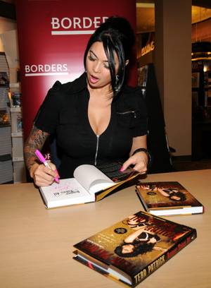 Tera Patrick signs her book <em>Sinner Takes All</em> at Borders in Town Square on Jan. 8, 2010.