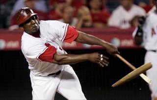 Los Angeles Angels'  Vladimir Guerrero breaks his bat against the Baltimore Orioles during the third inning of their baseball game Tuesday, Sept. 5, 2006, in Anaheim, Calif. 