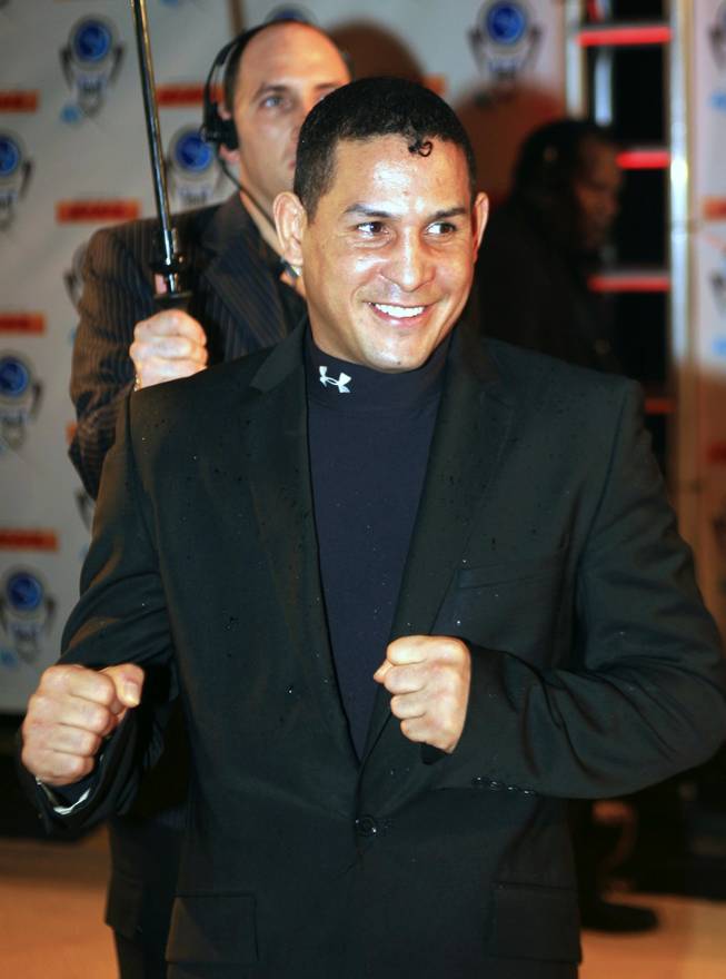FILE - In this Dec. 14, 2006, file photo, boxer Hector "Macho" Camacho of Puerto Rico arrives for the Premios Fox Sports at the Jackie Gleason Theater in Miami Beach, Fla. Camacho's life and career have taken more turns than a pulp novel, from the gritty streets of Spanish Harlem to the bright lights of the Golden Gloves, from walking between the bars of a jail cell to stepping between the ropes of the ring. 