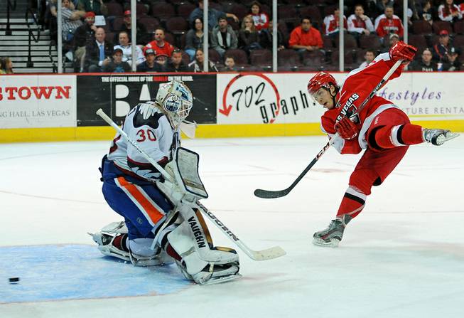 Las Vegas Wranglers forward Chad Nehring scores on a penalty shot against Bakersfield Condors goaltender Laurent Brossoit during the third period of play on Tuesday night.