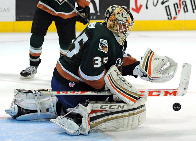 Utah Grizzlies goaltender Igor Bobkov makes a save against the Las Vegas Wranglers during the third period of play on Friday night.