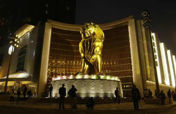 The MGM Grand Macau is lit up during the opening of the casino resort in Macau Tuesday, Dec. 18, 2007. 