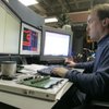 Electronics research engineer Glenn Mercier works on a project to test LED lighting displays in the Electronics research engineer Glenn Mercier works on a project to test LED lighting displays in the