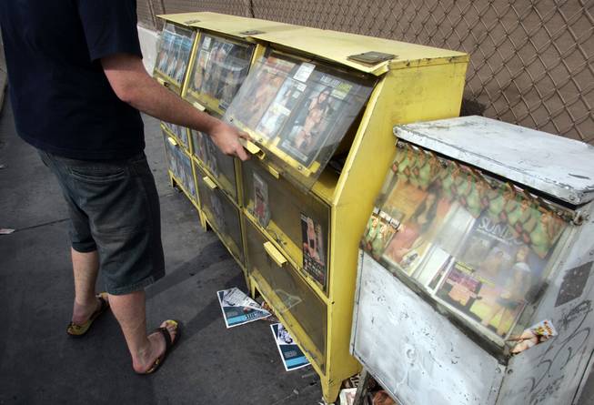 Owners of racy news racks get a breather while they sue