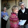 Rory and Cindy Reid turn to greet Peggy Ganopole’s neighbors while canvassing Sunday for Sen. Hill Rory and Cindy Reid turn to greet Peggy Ganopole’s neighbors while canvassing Sunday for Sen. Hill