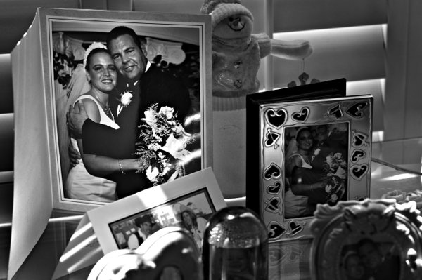 The Urbanskis' wedding pictures from nine years ago are displayed ...