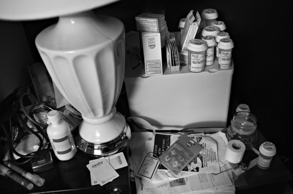 Prescriptions and medical supplies fill the small counter spaces in ...