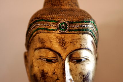 A statue of Buddha brought home from Burma by George Cohan, 83, a UNLV lecturer, who has traveled to 114 countries in his life. 