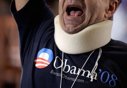 Hamid Sayadi, a Henderson resident from Iraq, cheers while Democratic presidential hopeful Sen. Barack Obama speaks during a town hall meeting at Del Sol High School in Las Vegas Friday, January 11, 2008.