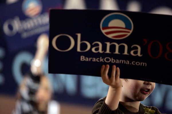 Gavin Sloan, 4, holds a sign while Democratic presidential hopeful ...