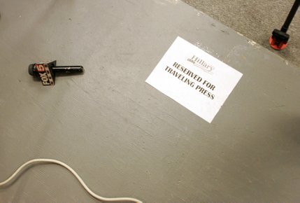 A television microphone rests on a press riser as Sen. Hillary Clinton speaks to supporters at the Sheet Metal Workers Union Saturday, Jan. 12, 2008.