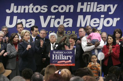 Backed by a cadre of politicians and supporters, presidential candidate Sen. Hillary Clinton speaks during a rally at the Sheet Metal Workers Union Saturday, Jan. 12, 2008.